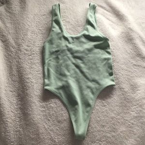 Lime green body suit